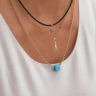 Layering with Intention: Crafting Your Signature Stack - Georgina Nicol