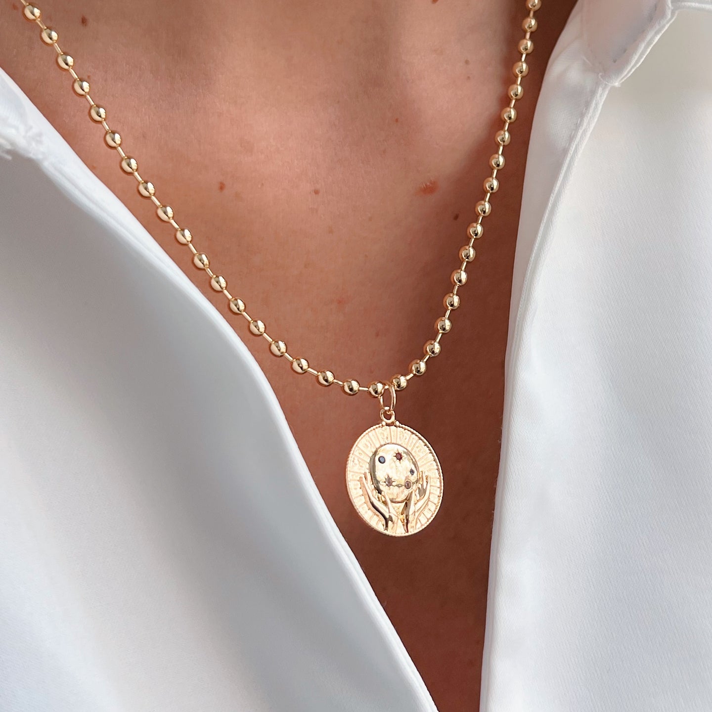 Hold the Universe Within – Gold Celestial Hands Necklace