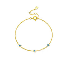 Load image into Gallery viewer, Blue Cz Triangle Chain Bracelet with a triangular charm set in 18k gold-plated sterling silver.
