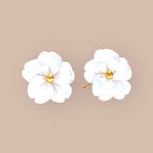 Load image into Gallery viewer, Close-up of Mother of Pearl Daisy Flower Earrings on a jewelry display.

