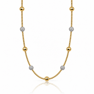 Close-up of clear cubic zirconia pavé balls and polished gold beads on a delicate 14K gold-filled necklace.

