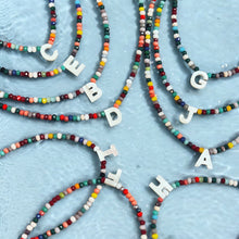 Load image into Gallery viewer, Elegant initial name necklace featuring Mother of Pearl and colorful beads.
