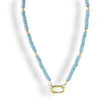 Load image into Gallery viewer, Close-up of Front Clasp Blue Disc Necklace, showcasing the blue disc and unique clasp.

