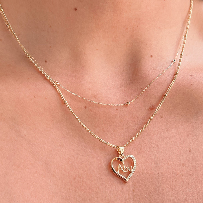 Gold heart pendant necklace for grandmothers, sentimental jewelry gift, tarnish-free and hypoallergenic, perfect for everyday wear.