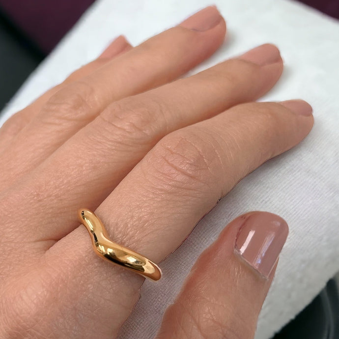 Asymmetrical ring with a modern, unique design for a bold and stylish look