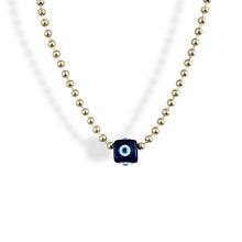 Load image into Gallery viewer, Close-up of gold plated evil eye necklace for protection.
