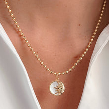 Load image into Gallery viewer, Glow from Within – Sun Necklace in Mother of Pearl &amp; Gold - Georgina Nicol
