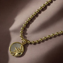 Load image into Gallery viewer, Glow from Within – Sun Necklace in Mother of Pearl &amp; Gold - Georgina Nicol
