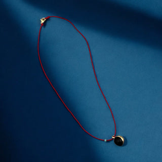 I Am Surrounded by Protection and Strength — Red String Necklace with Ox - Eye Seed Pendant - Georgina Nicol