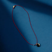 Load image into Gallery viewer, I Am Surrounded by Protection and Strength — Red String Necklace with Ox - Eye Seed Pendant - Georgina Nicol
