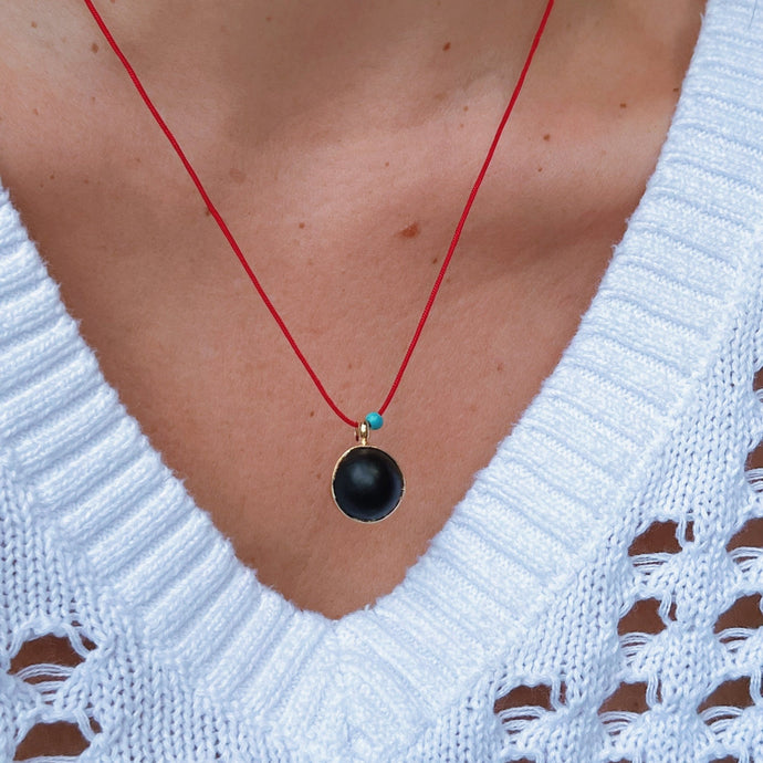 I Am Surrounded by Protection and Strength — Red String Necklace with Ox - Eye Seed Pendant - Georgina Nicol