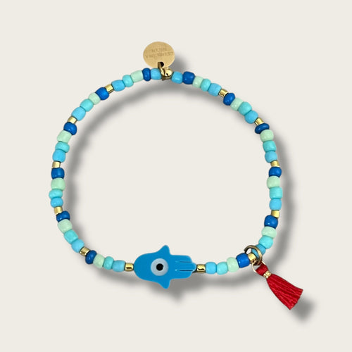 I Attract Protection and Positive Energy — Blue Hamsa Evil Eye Bracelet - Georgina Nicol