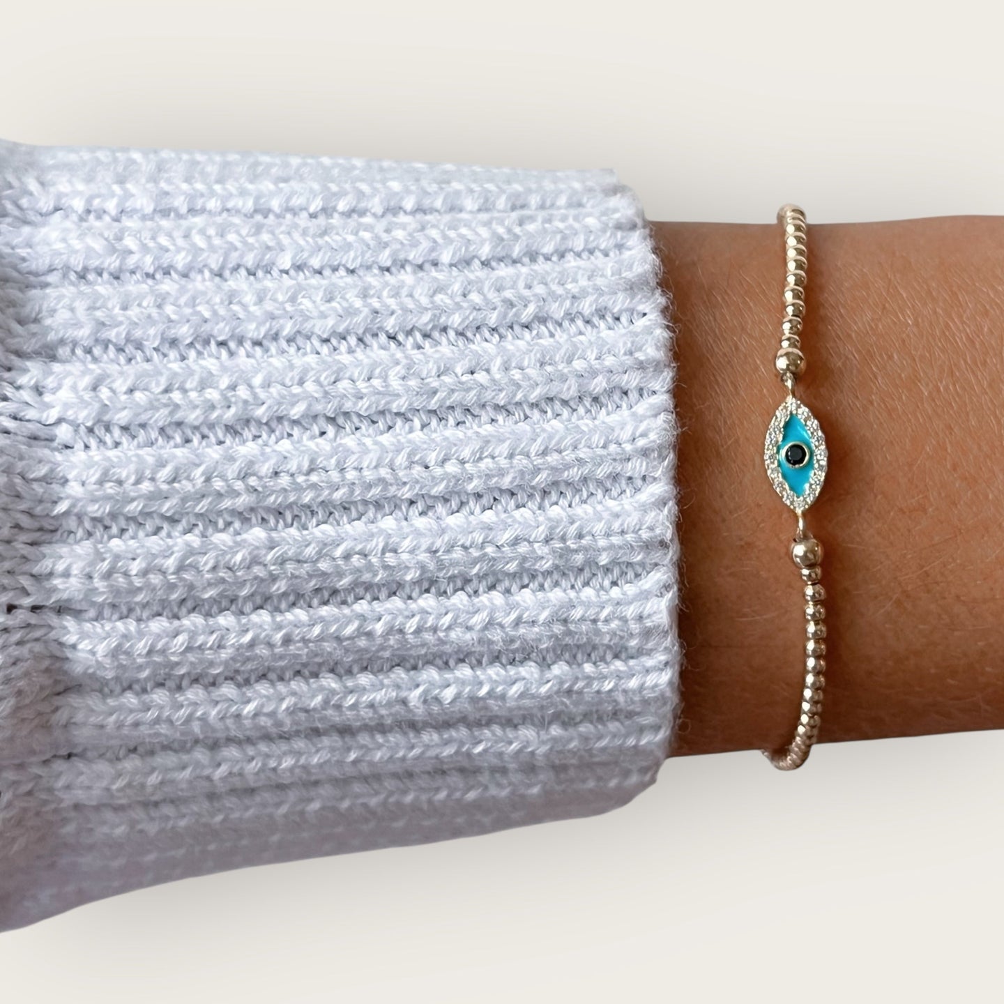 I Attract Protection and Positive Energy — Tiny Evil Eye Beaded Bracelet - Georgina Nicol