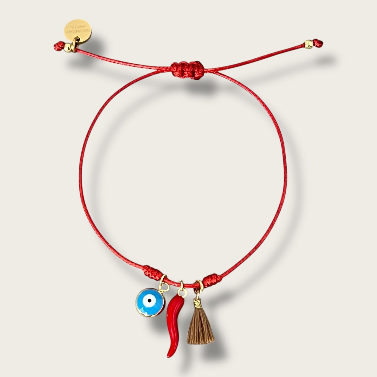 I Attract Protection, Power, and Good Fortune — Evil Eye & Cornicello Red Bracelet - Georgina Nicol