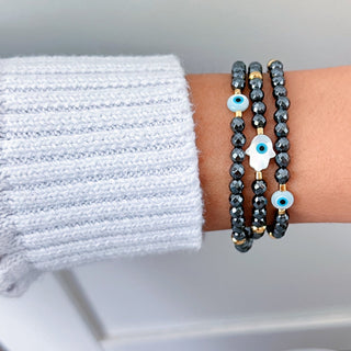 I Radiate Divine Protection and Elegance — Hematite Evil Eye & Hamsa Convertible Stretch Necklace - Bracelet - Georgina Nicol