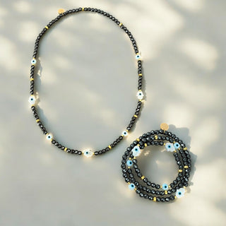 I Radiate Divine Protection and Elegance — Hematite Evil Eye & Hamsa Convertible Stretch Necklace - Bracelet - Georgina Nicol