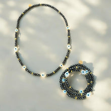 Load image into Gallery viewer, I Radiate Divine Protection and Elegance — Hematite Evil Eye &amp; Hamsa Convertible Stretch Necklace - Bracelet - Georgina Nicol
