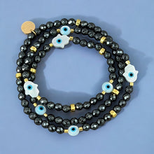 Load image into Gallery viewer, I Radiate Divine Protection and Elegance — Hematite Evil Eye &amp; Hamsa Convertible Stretch Necklace - Bracelet - Georgina Nicol
