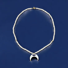 Load image into Gallery viewer, I Trust My Intuition and Embrace New Beginnings — Evil Eye Crescent Pearl Necklace - Georgina Nicol
