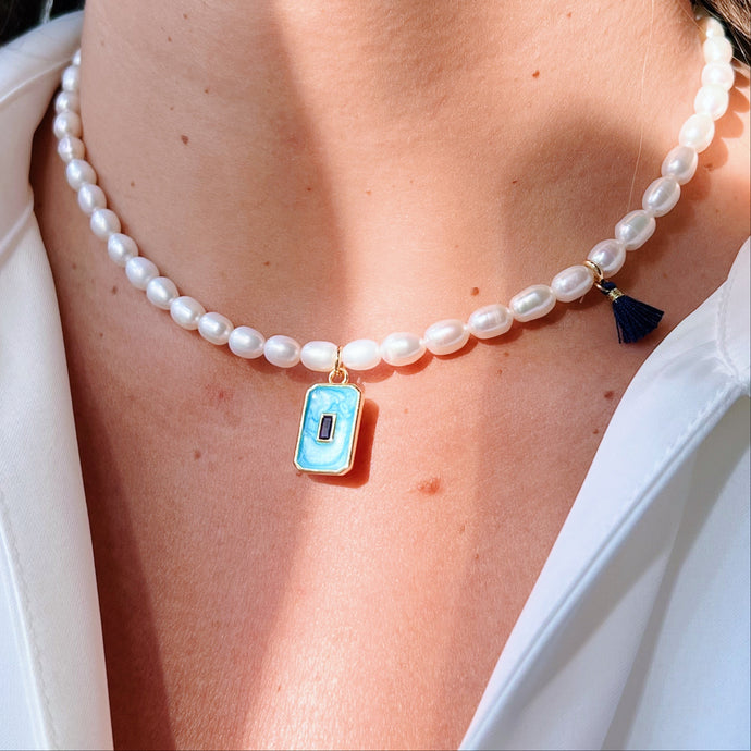 Model wearing the Blue Square Pearl Necklace, showcasing its elegant and versatile style.