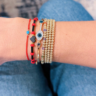 Protected by Strength — Tiny Azabache Heart Bracelet - Georgina Nicol