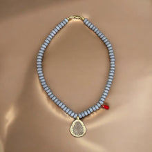 Load image into Gallery viewer, Symbol of Clarity &amp; Prosperity - Clear Buddha Bead Necklace - Georgina Nicol
